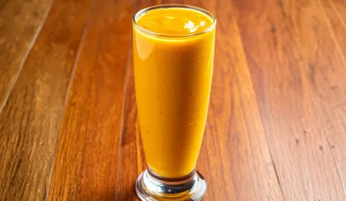 A tall glass of mango lassi at Delhi Palace Brantford