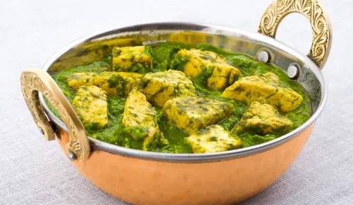 Palak paneer with soft cottage cheese in spinach gravy at Delhi Palace Brantford