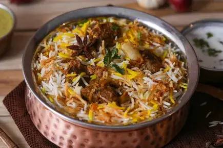Biryani served in a copper pot