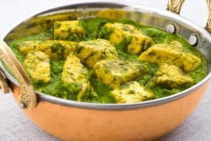 Indian vegetarian curry in a copper karahi